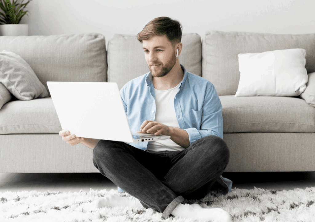A man reviewing mortgage strategies on his laptop.